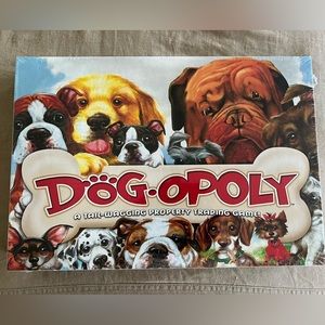 Dogopoly.  A tail wagging property trading game.  For 2-6 players.  NWT